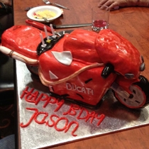 A red motorbike cake by Sooo Delicious brightened up Jason's birthday.