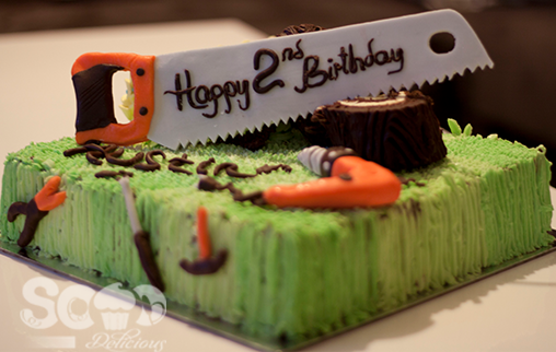 This striking tools-themed Birthday cake was made for Austin's 2nd Birthday.